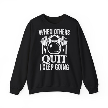 When Others Quit I Keep Going Unisex Heavy Blend™ Crewneck Sweatshirt